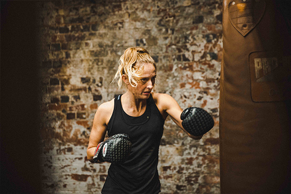 woman punching bag