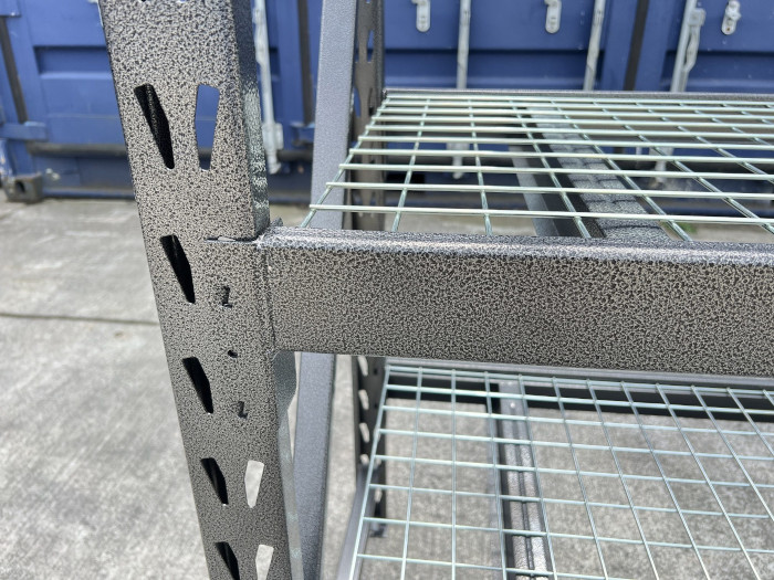 Shelving with wire shelves on pallet rack