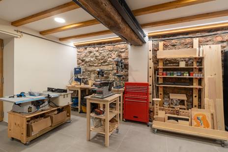 tidy space in a spare room or garage for a workshop